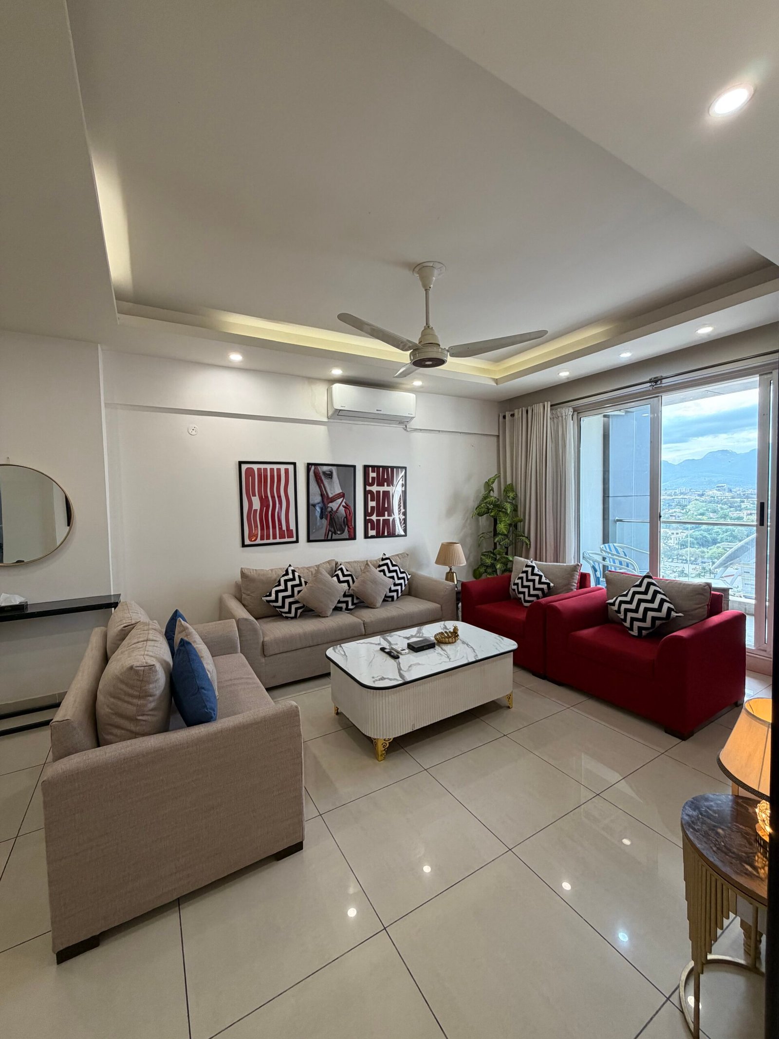 Furnished apartment living area Elysium Tower